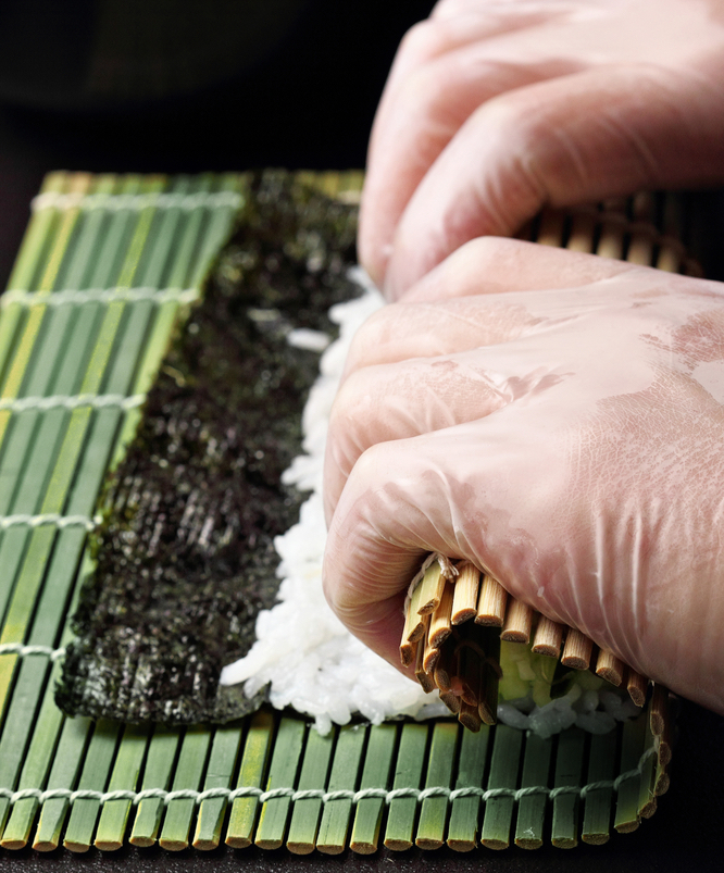 Sushi making tuck and roll